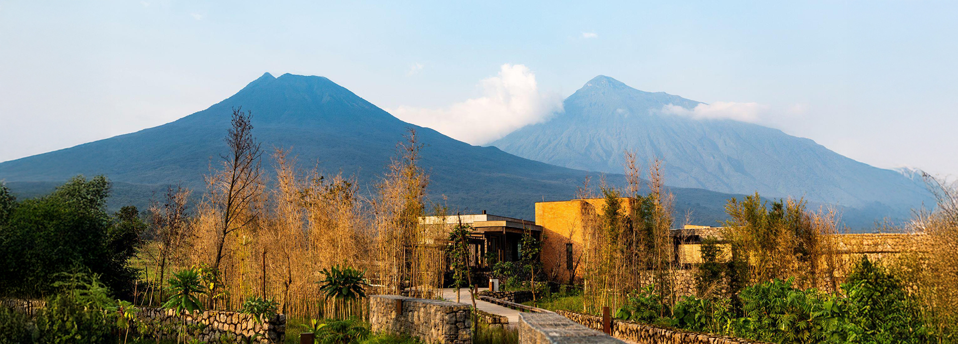 The contemporary Kataza House luxury lodge rests in the foothills of Volcanoes National Park Rwanda
