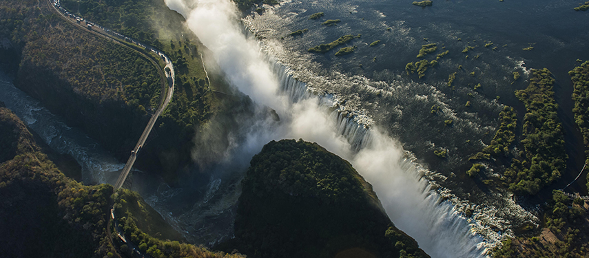 Dramatic aerial view of Victoria Falls and surrounding landscape