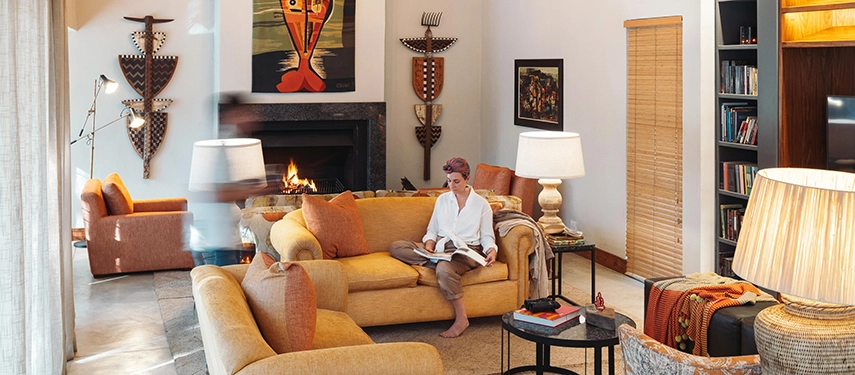 The comfortable lounge at Simbavati Camp George offers a welcoming space to relax between game drives.