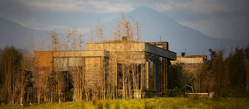 The contemporary Kataza House luxury lodge rests in the foothills of Volcanoes National Park Rwanda