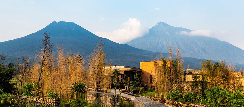 The contemporary Kataza House luxury lodge rests in the foothills of Volcanoes National Park Rwanda