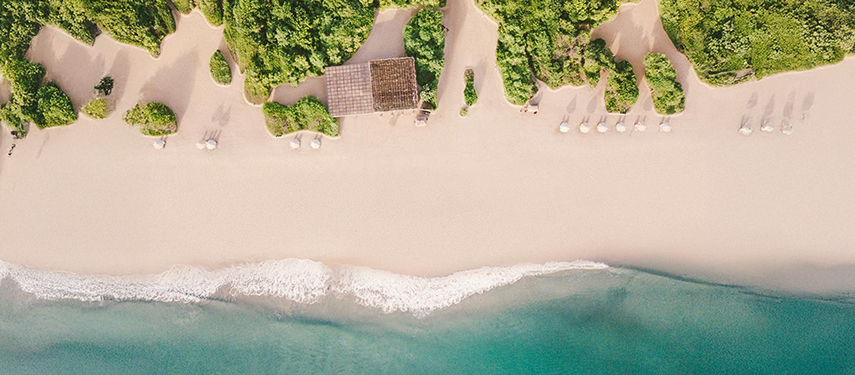Aerial view of Uga Jungle Beach on a beautiful sandy beach in Sri Lanka