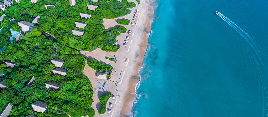 Aerial view of Uga Jungle Beach on a beautiful sandy beach in Sri Lanka