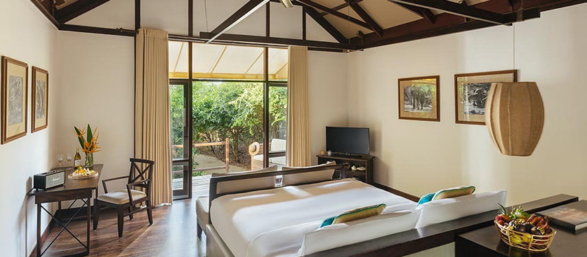 Tranquil double suite with private pool views at Uga Jungle Beach