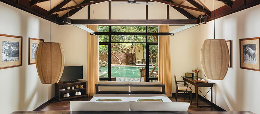 Tranquil double suite with private pool views at Uga Jungle Beach