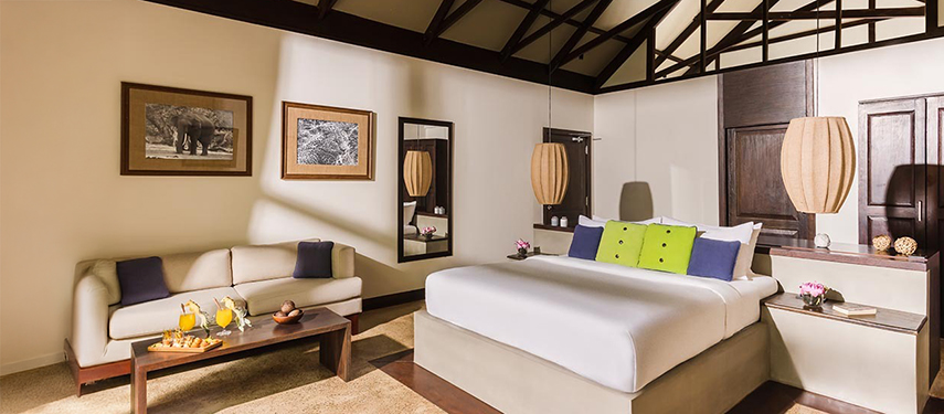Tranquil double suite with private pool views at Uga Jungle Beach