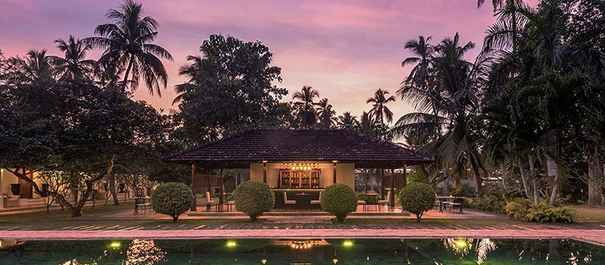Exterior of Uga Riva hotel at sunset in Sri Lanka
