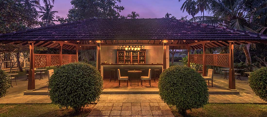 Exterior of Uga Riva hotel bar at sunset in Sri Lanka