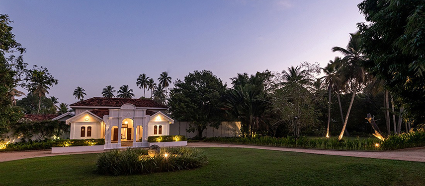 Exterior of Uga Riva hotel at sunset in Sri Lanka