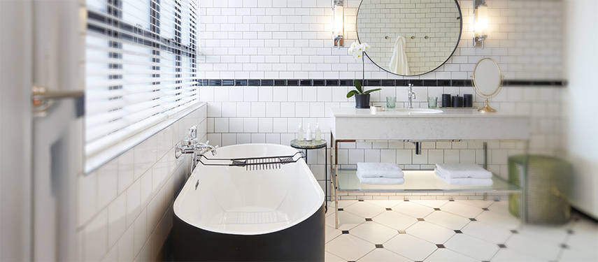 Stunning luxurious white-tiled bathroom in Cape Town