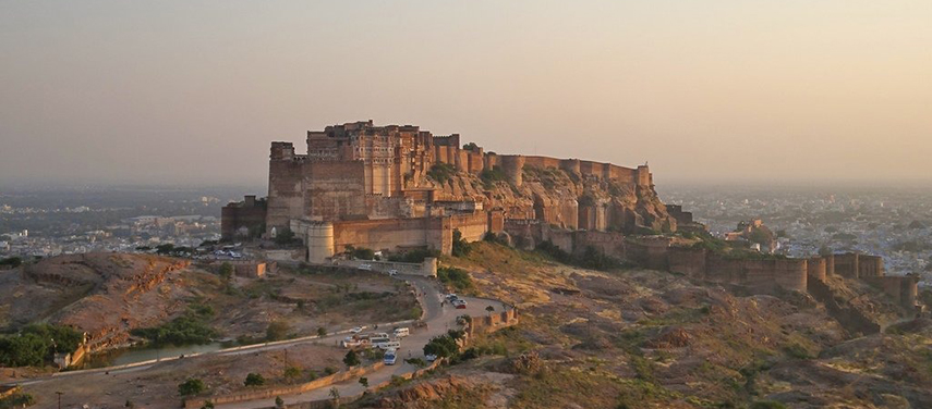 Majestic sunset view of Mehrangarh Fort from The Stepwell House rooftop.