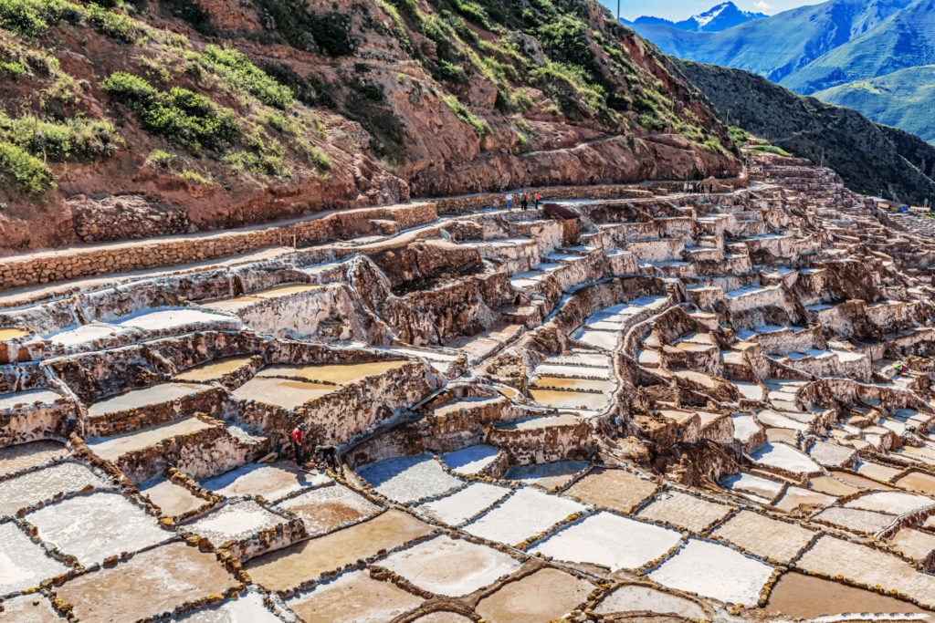View at Salinas de Maras, man made salt evaporation pond called also salt mines near town of Maras in the Sacred Valley of the Incas and near Cusco in Peru.